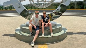 A photo moment at Kikorongo Equator Monument