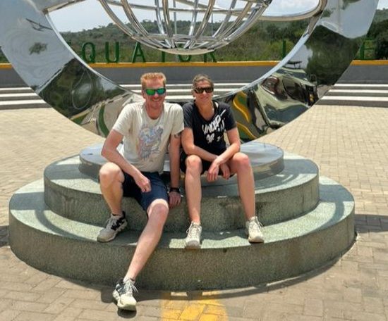 A photo moment at Kikorongo Equator Monument