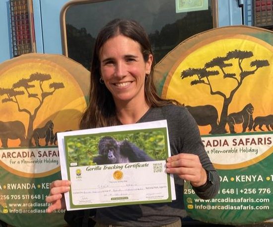 Our Guest with her Gorilla Habituation Certificate after the Experience