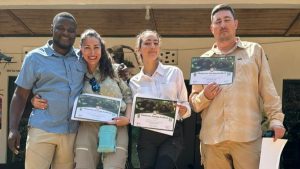 Our Guests with their Chimpanzee Tracking Certificates