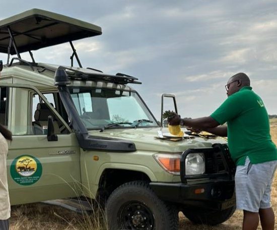 Our Senior Guide preparing the Pineapple for our Guests under the wilds