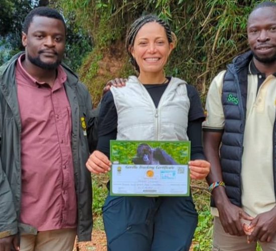 Our Solo Traveler with a Gorilla Trekking Certificate after the Trek